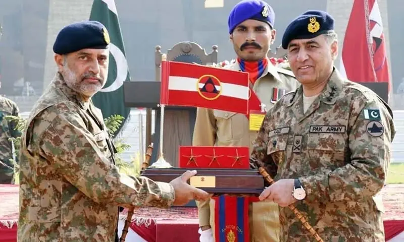 In this file photo, Lieutenant General Nauman Mahmood hands over the command of Peshawar Corps to former DG ISI Lieutenant General Faiz Hameed at Corps Headquarters Peshawar, in this photo from November 22, 2021. &mdash; ISPR/File