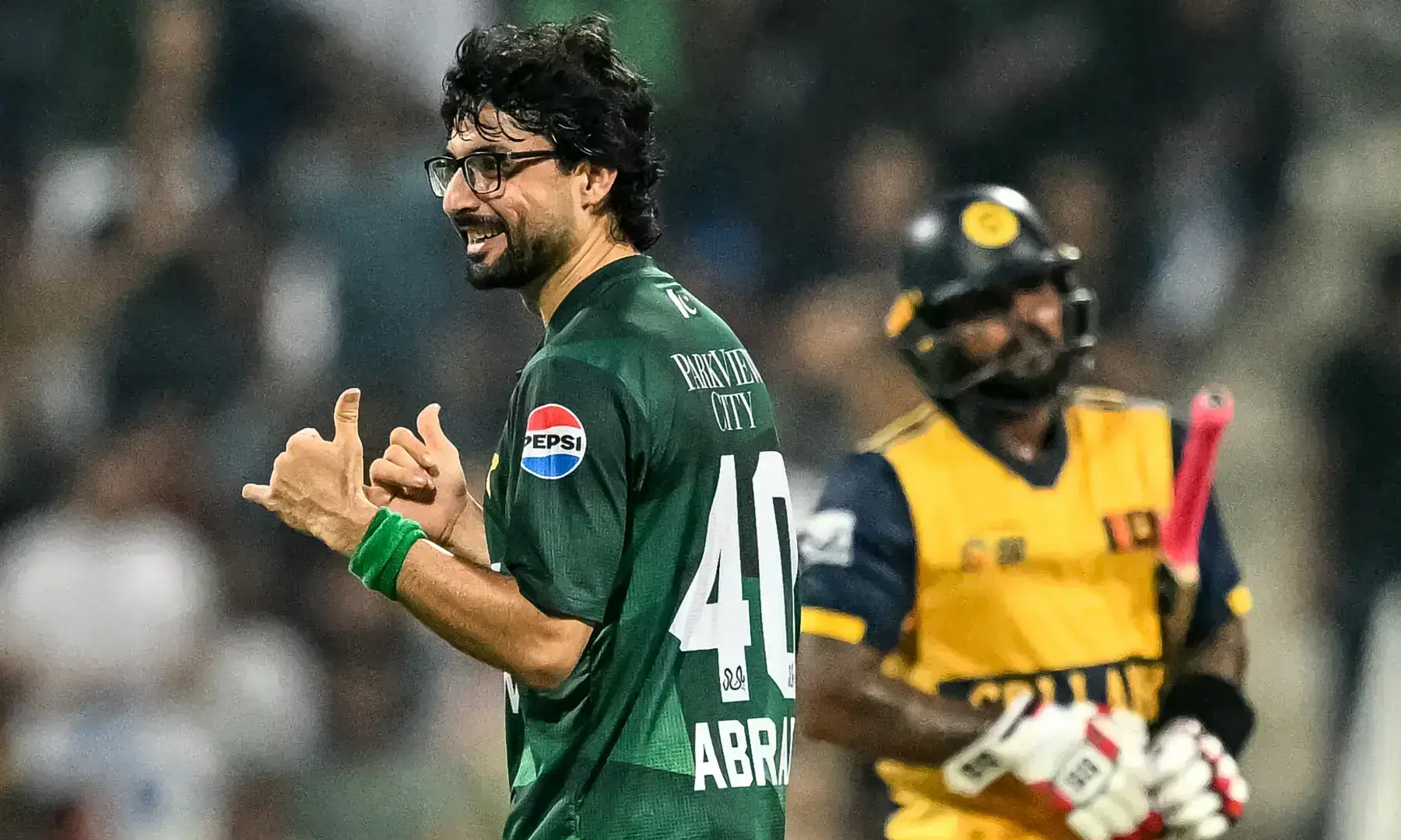 Abrar Ahmed (L) celebrates after taking the wicket of Sri Lanka&rsquo;s Wanindu Hasaranga during the Asia Cup 2025. &mdash; AFP/File