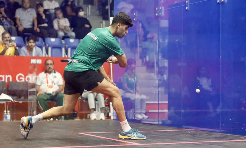 NAGOYA: Pakistan&rsquo;s Noor Zaman in action during his Asian Games squash match against Van Aero Dalida of the Philippines at the Nagoya Kinjo Futo Arena on Wednesday.&mdash;Courtesy POA