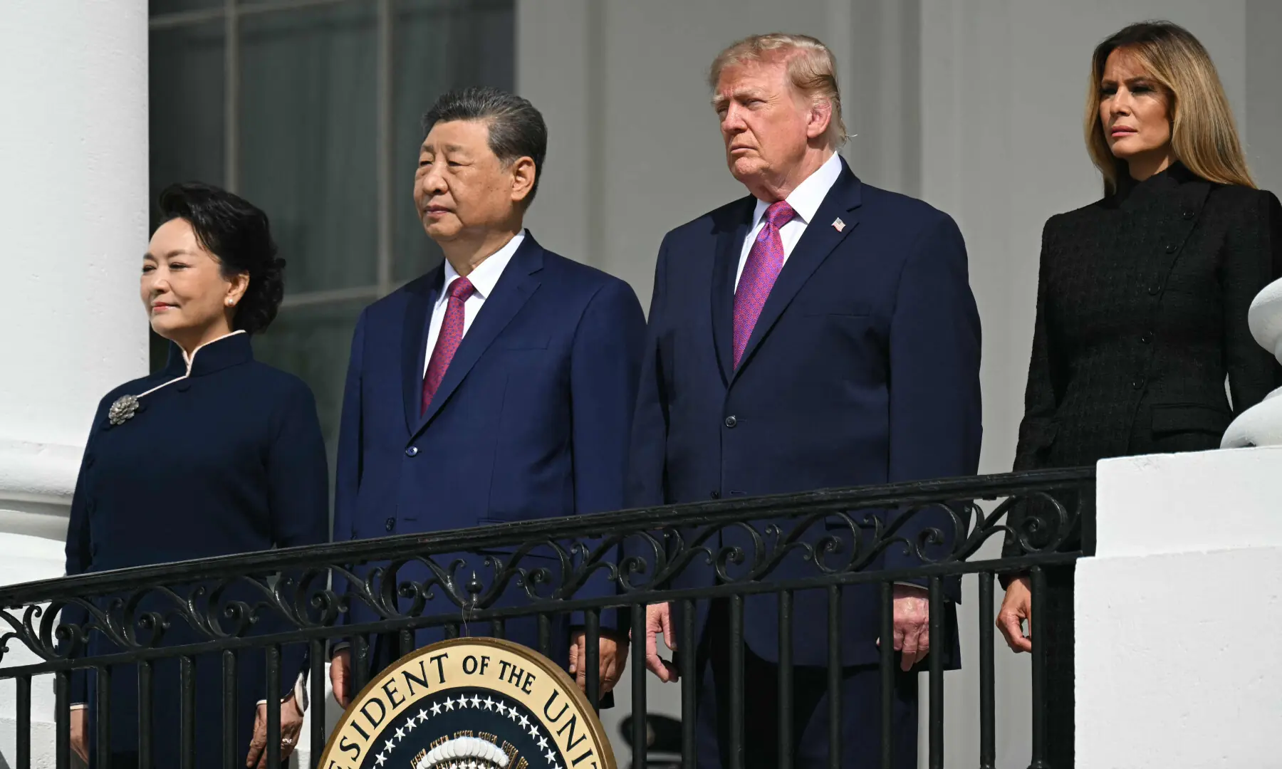 China's First Lady Peng Liyuan, China's President Xi Jinping, US President Donald Trump and US First Lady Melania Trump stand on the Blue Room balcony of the White House to watch an exhibition of the US Marine Corps Silent Drill Platoon, in Washington, DC, on Sept 24, 2026. — AFP China's First Lady Peng Liyuan, China's President Xi Jinping, US President Donald Trump and US First Lady Melania Trump stand on the Blue Room balcony of the White House to watch an exhibition of the US Marine Corps Silent Drill Platoon, in Washington, DC, on Sept 24, 2026. — AFP