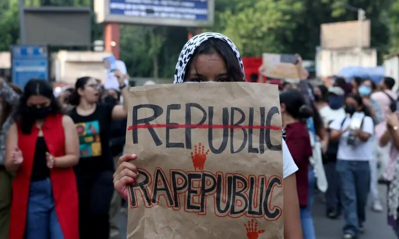 A college student holds a placard during a solidarity march demanding police action and better safety for women following the alleged gang rape of a girl, in New Delhi, India, on September 23, 2026. — Reuters A college student holds a placard during a solidarity march demanding police action and better safety for women following the alleged gang rape of a girl, in New Delhi, India, on September 23, 2026. — Reuters