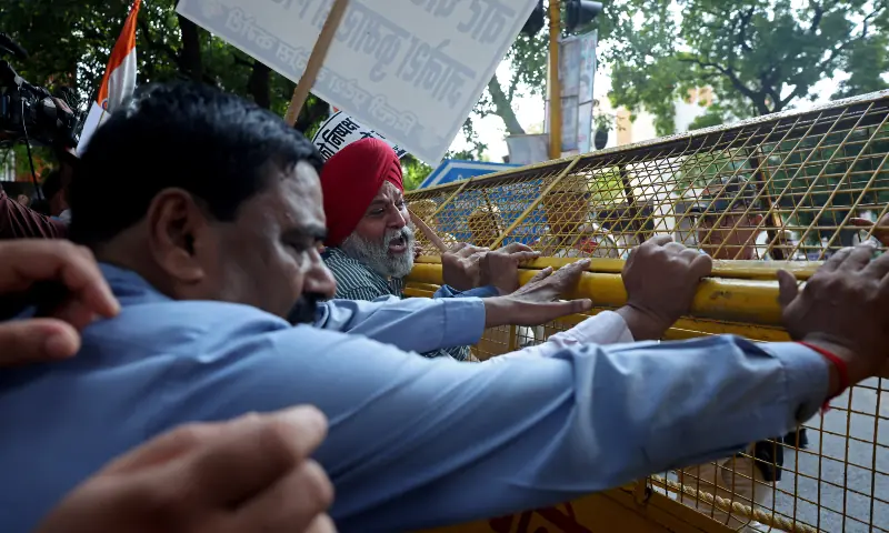 Supporters of India's main opposition Congress party try to remove a police barricade during a protest demanding the resignation of India's Chief Election Commissioner Gyanesh Kumar, in New Delhi, India on September 25, 2026. — Reuters Supporters of India's main opposition Congress party try to remove a police barricade during a protest demanding the resignation of India's Chief Election Commissioner Gyanesh Kumar, in New Delhi, India on September 25, 2026. — Reuters
