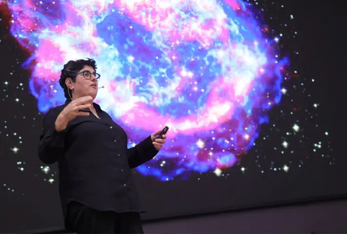 Dr Nergis Mavalvala speaks at the event.—Photo by the writer Dr Nergis Mavalvala speaks at the event.—Photo by the writer