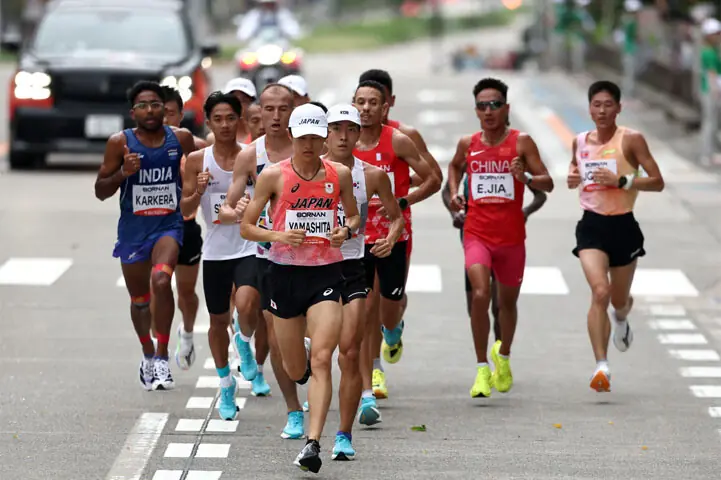 Japan’s Ichitaka Yamashita (front) runs during the Asian Games men’s marathon final on Saturday. —Reuters Japan’s Ichitaka Yamashita (front) runs during the Asian Games men’s marathon final on Saturday. —Reuters