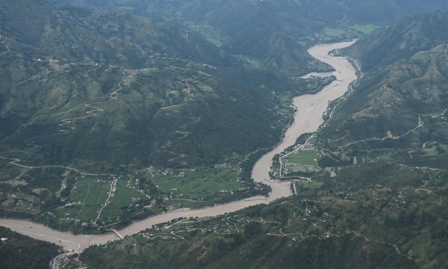 An aerial view taken from inside a commercial aircraft shows Trishuli river in Nepal's Dhading district on September 1, 2026 in the aftermath of flash floods. &mdash;AFP/File