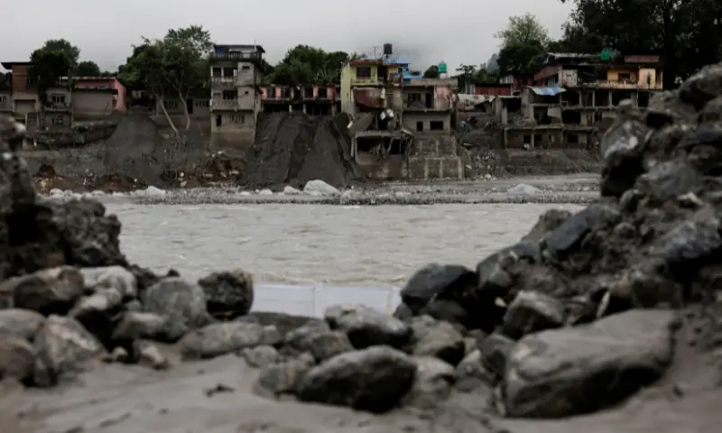 Damaged houses following deadly flash floods and a mudslide, in Devighat, Nuwakot district, Nepal, on Sept 21, 2026. &mdash; Reuters