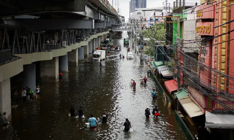 People navigate through a flooded area in Bangkok, Thailand, on September 28, 2026. — Reuters People navigate through a flooded area in Bangkok, Thailand, on September 28, 2026. — Reuters