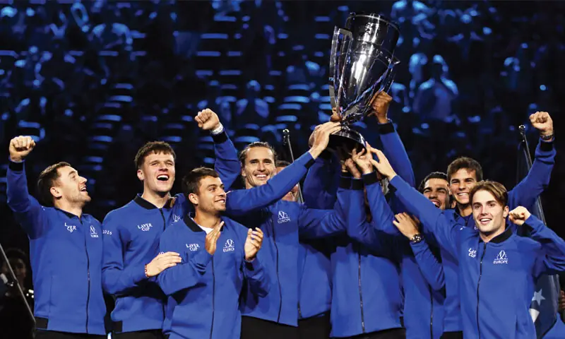 PLAYERS of Team Europe celebrate with the Laver Cup trophy after defeating Team World at the O2 Arena.—Reuters PLAYERS of Team Europe celebrate with the Laver Cup trophy after defeating Team World at the O2 Arena.—Reuters