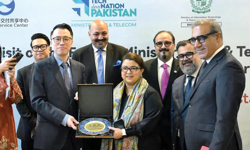 Federal IT Minister Shaza Fatima Khawaja being presented a shield during her visit to Huawei’s Global Support Centre in Islamabad on Monday. — APP Federal IT Minister Shaza Fatima Khawaja being presented a shield during her visit to Huawei’s Global Support Centre in Islamabad on Monday. — APP