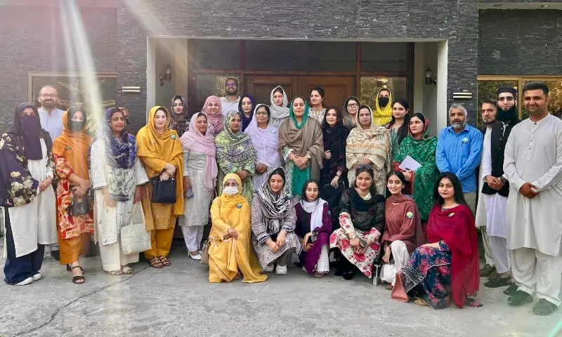 Participants pose for a group photograph with ruling PML-N legislator Maryam Kashmiri at the close of a workshop on climate change, development and women’s empowerment. -- Photo via author Participants pose for a group photograph with ruling PML-N legislator Maryam Kashmiri at the close of a workshop on climate change, development and women’s empowerment. -- Photo via author