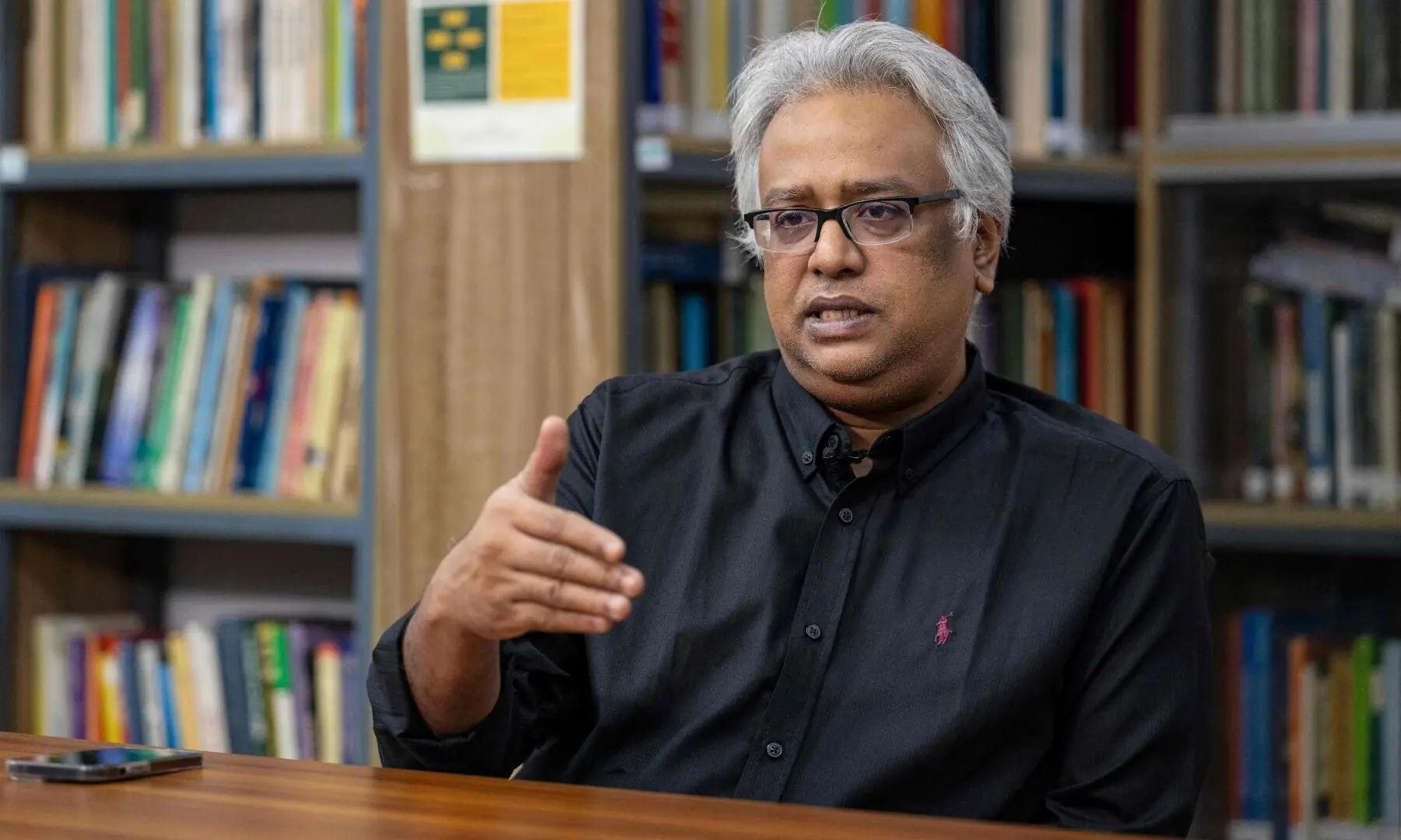This photograph taken on September 7, 2026 shows Asif Shahan, a professor at Dhaka University&rsquo;s Department of Development Studies speaking during an interview with AFP inside the campus in Dhaka. &mdash;AFP