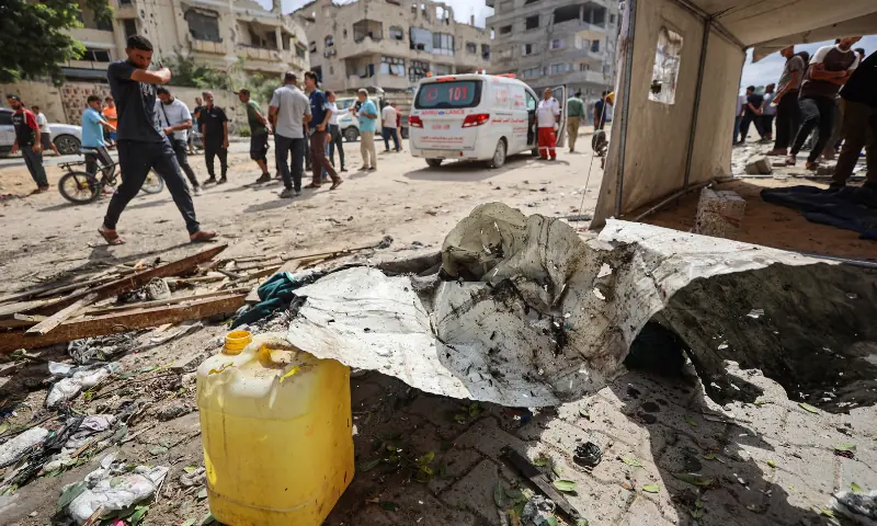 Palestinians inspect the damage following an Israeli airstrike that targeted a minibus and killed five people in Gaza City's Tel al-Hawa neighbourhood on September 30, 2026, according to Gaza's civil defence agency and a hospital. — AFP Palestinians inspect the damage following an Israeli airstrike that targeted a minibus and killed five people in Gaza City's Tel al-Hawa neighbourhood on September 30, 2026, according to Gaza's civil defence agency and a hospital. — AFP