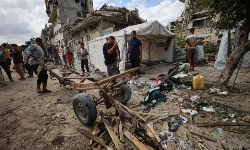 Palestinians inspect the damage following an Israeli airstrike that targeted a minibus and killed five people in Gaza City's Tel al-Hawa neighbourhood on September 30, 2026, according to Gaza's civil defence agency and a hospital. — AFP Palestinians inspect the damage following an Israeli airstrike that targeted a minibus and killed five people in Gaza City's Tel al-Hawa neighbourhood on September 30, 2026, according to Gaza's civil defence agency and a hospital. — AFP