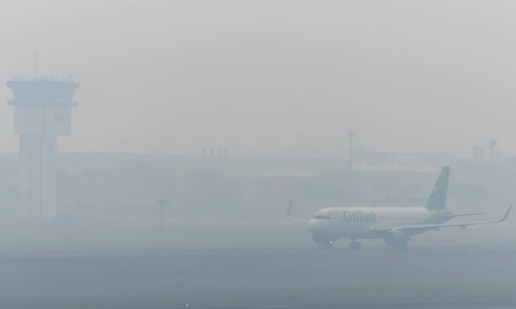 A Citilink Airbus prepares to take off as haze from wildfires shrouds Sultan Mahmud Badaruddin II International Airport in Palembang, South Sumatra province, Indonesia on September 30, 2026. —Reuters A Citilink Airbus prepares to take off as haze from wildfires shrouds Sultan Mahmud Badaruddin II International Airport in Palembang, South Sumatra province, Indonesia on September 30, 2026. —Reuters