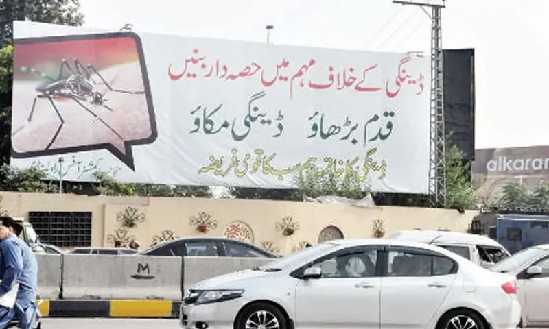 A dengue awareness banner at Kutchery Chowk, Rawalpindi. &mdash; Online