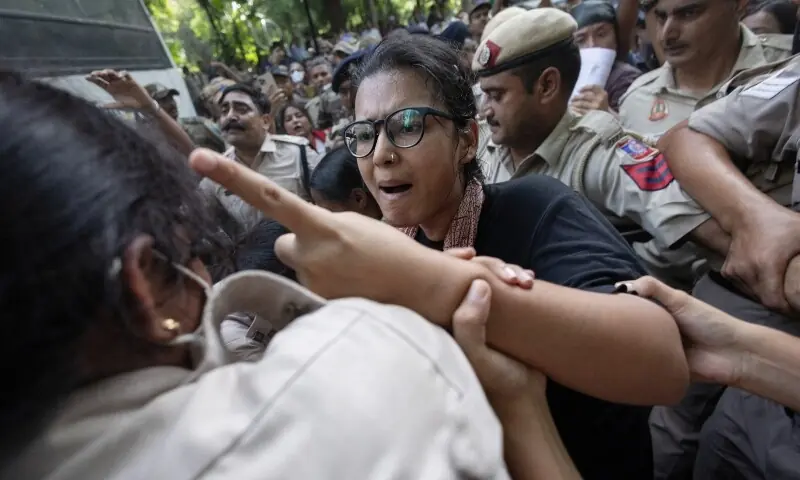 Neha Bora, National President of the All India Students&rsquo; Association (AISA), is detained by police during a protest demanding the resignation of India&rsquo;s Chief Election Commissioner Gyanesh Kumar, in New Delhi, India on October 3, 2026. &mdash; Reuters