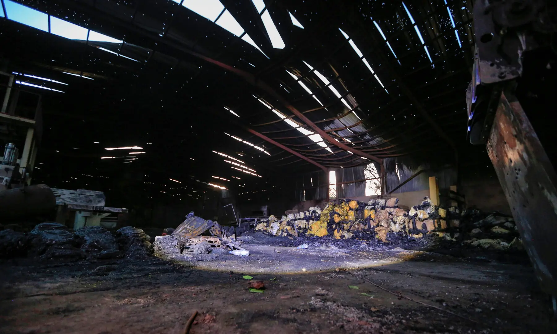 This photo shows a general view of melted foam inside a factory after a strike that Houthi authorities-run media attributed to Saudi Arabia, in the Shamlan neighbourhood of Yemen's capital Sanaa on Oct 4, 2026. — AFP This photo shows a general view of melted foam inside a factory after a strike that Houthi authorities-run media attributed to Saudi Arabia, in the Shamlan neighbourhood of Yemen's capital Sanaa on Oct 4, 2026. — AFP