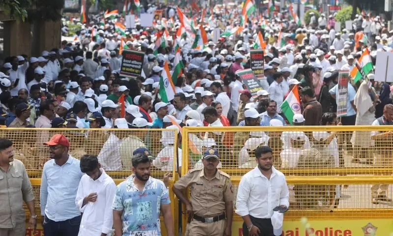 Supporters gather behind a barricade during a protest demanding the resignation of India&rsquo;s Chief Election Commissioner Gyanesh Kumar organised by the Shiv Sena (UBT) and the Maharashtra Navnirman Sena (MNS) in Mumbai, India, October 4, 2026. &mdash;Reuters