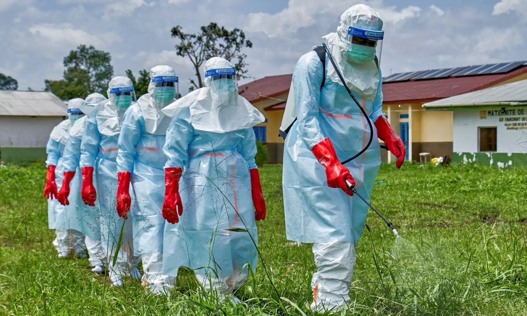 Red Cross workers walk in a formation as they disinfect Rwampara general hospital before handling the body of a person who died of Ebola, as aid agencies intensify efforts to contain a new Ebola outbreak involving the Bundibugyo strain, in Rwampara outside Bunia, Ituri province, Democratic Republic of Congo on May 21, 2026. —Reuters/File