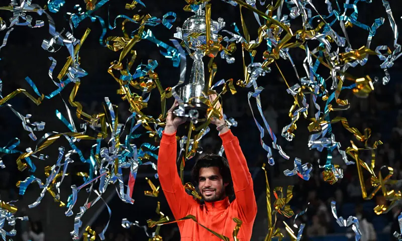 SPAIN’S Carlos Alcaraz lifts the Japan Open trophy after beating Jiri Lehecka of the Czech Republic in the final at the Ariake Tennis Forest Park on Tuesday.—AFP SPAIN’S Carlos Alcaraz lifts the Japan Open trophy after beating Jiri Lehecka of the Czech Republic in the final at the Ariake Tennis Forest Park on Tuesday.—AFP