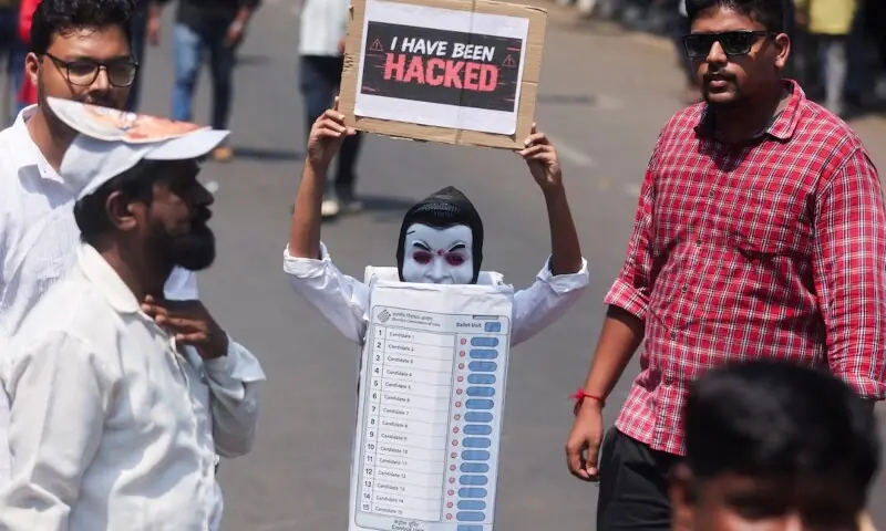 supporter dressed as an electronic voting machine (EVM) holds a placard during a protest demanding the resignation of India’s Chief Election Commissioner Gyanesh Kumar organised by the Shiv Sena (UBT) and the Maharashtra Navnirman Sena (MNS) in Mumbai, India, October 4, 2026. —Reuters