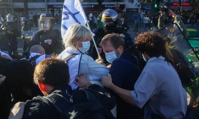 Protesters face French CRS riot police outside Lycee Helene-Boucher high school as students block the road, during nationwide protests in Paris, France, October 8, 2026, to demand better school conditions. —Reuters