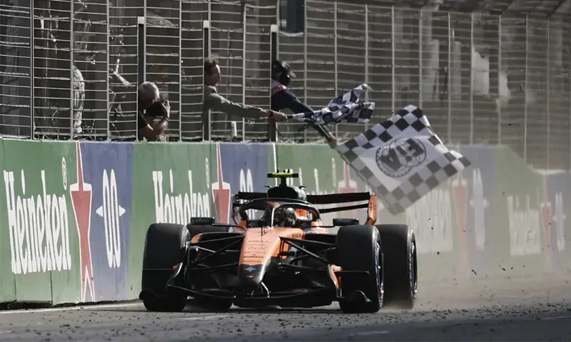 McLaren&rsquo;s driver Lando Norris of Britain crosses the finish line to win the Formula One Dutch Grand Prix at Circuit Zandvoort on Sunday, August 24, 2026.&mdash;Reuters