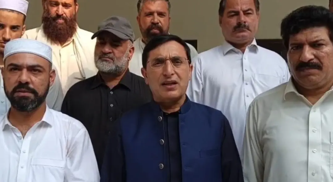   PTI Chairman Barrister Gohar Khan speaks to the media in Charsadda on Oct 8. &mdash; Photo by Faiz Muhammad