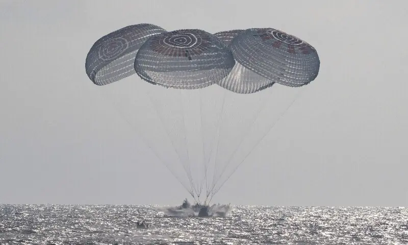 This picture provided by Nasa shows the SpaceX Crew Dragon Freedom spacecraft as it lands with Nasa astronauts Jessica Meir, Jack Hathaway, European Space Agency astronaut Sophie Adenot, and Roscosmos cosmonaut Andrey Fedyaev aboard in the Pacific Ocean off the coast of Los Angeles, California, on October 8, 2026. —AFP This picture provided by Nasa shows the SpaceX Crew Dragon Freedom spacecraft as it lands with Nasa astronauts Jessica Meir, Jack Hathaway, European Space Agency astronaut Sophie Adenot, and Roscosmos cosmonaut Andrey Fedyaev aboard in the Pacific Ocean off the coast of Los Angeles, California, on October 8, 2026. —AFP