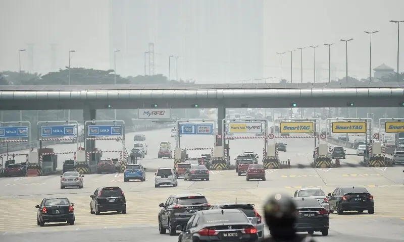 Traffic moves along a highway amid hazy condition in Kuala Lumpur on October 9, 2026. &mdash;AFP