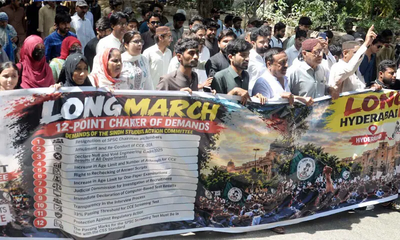 HYDERABAD: Unsuccessful candidates leave their protest camp for Karachi to stage a protest outside Chief Minister House.—Photo by Umair Ali HYDERABAD: Unsuccessful candidates leave their protest camp for Karachi to stage a protest outside Chief Minister House.—Photo by Umair Ali