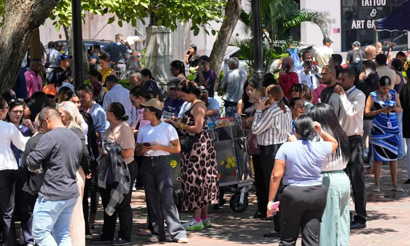People evacuated from a building gather at a square after the earthquake hit Panama City.—AFP People evacuated from a building gather at a square after the earthquake hit Panama City.—AFP