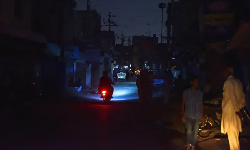 One of the city localities is engulfed in darkness during routine loadshedding.&mdash;Fahim Siddiqi / White Star