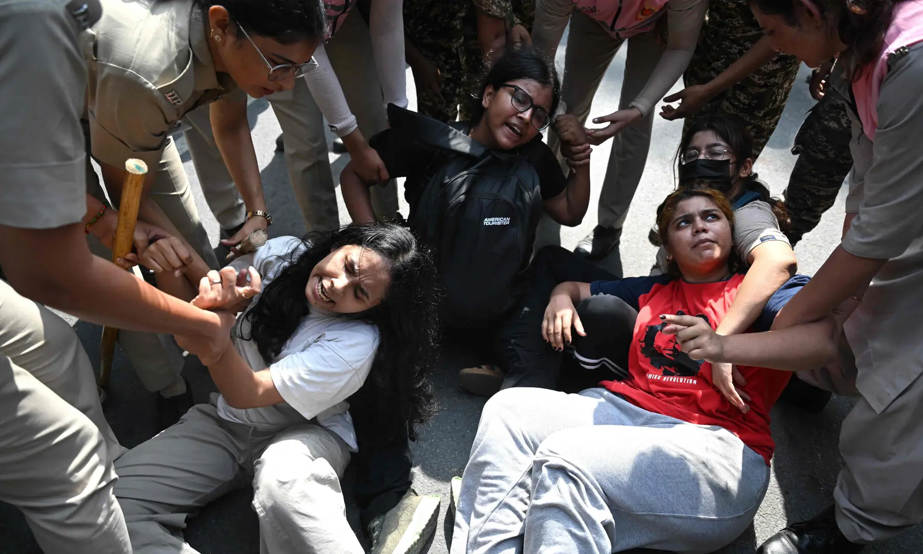 Police personnel detain supporters of the Cockroach Janata Party (CJP) during a protest demanding the resignation of India’s Chief Election Commissioner Gyanesh Kumar over alleged voter roll irregularities linked to the “special intensive revision” (SIR), in New Delhi on Oct 10, 2026. — AFP Police personnel detain supporters of the Cockroach Janata Party (CJP) during a protest demanding the resignation of India’s Chief Election Commissioner Gyanesh Kumar over alleged voter roll irregularities linked to the “special intensive revision” (SIR), in New Delhi on Oct 10, 2026. — AFP