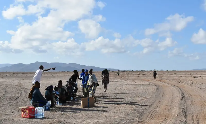 This handout picture released by the International Organisation for Migration (IOM) Djibouti on October 11, 2026 shows members of IOM Djibouti assisting survivors after a boat sank off the coast of Djibouti on the night of October 8-9. — AFP