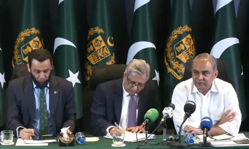 INTERIOR Minister Mohsin Naqvi addresses a presser alongside Atta Tarar and Azam Nazeer Tarar.—PTVNews INTERIOR Minister Mohsin Naqvi addresses a presser alongside Atta Tarar and Azam Nazeer Tarar.—PTVNews
