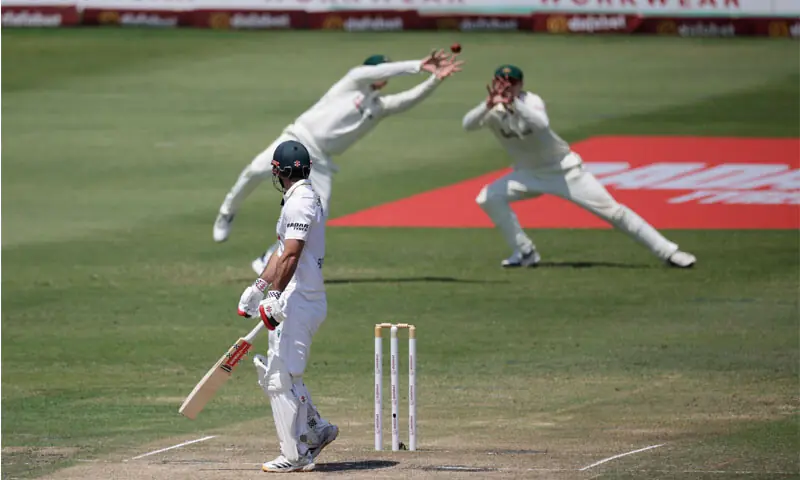 South African batter David Bedingham looks back at Australia’s Steve Smith as he catches him out on a delivery by pacer Pat Cummins during the first Test at Kingsmead on Sunday.—AFP South African batter David Bedingham looks back at Australia’s Steve Smith as he catches him out on a delivery by pacer Pat Cummins during the first Test at Kingsmead on Sunday.—AFP