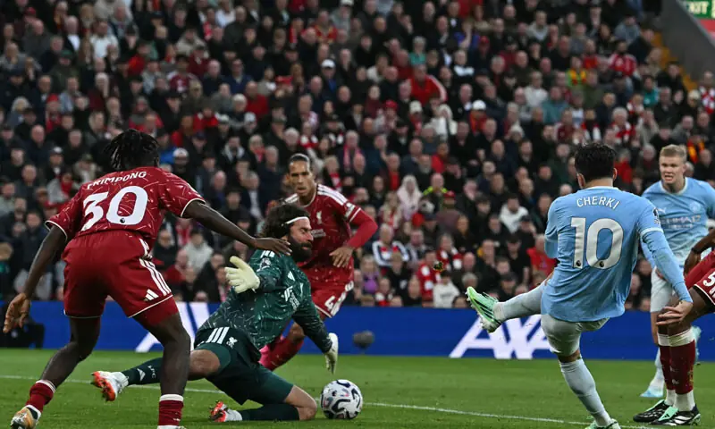 LIVERPOOL: Manchester City&rsquo;s Rayan Cherki shoots to score during the Premier League match against Liverpool at Anfield on Sunday.&mdash;AFP
