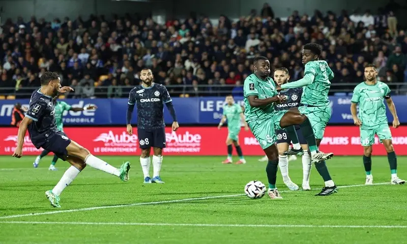 Olympique de Marseille's Amine Harit (L) shoots to score against Troyes during their Ligue 1 match at Stade de l'Aube in Troyes on October 11, 2026. —AFP Olympique de Marseille's Amine Harit (L) shoots to score against Troyes during their Ligue 1 match at Stade de l'Aube in Troyes on October 11, 2026. —AFP