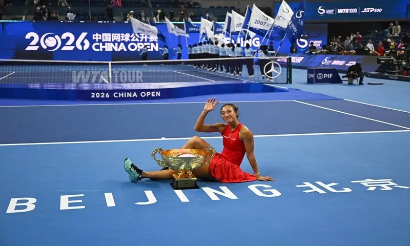 China’s Zheng Qinwen celebrates with the trophy after beating Russia’s Mirra Andreeva in the China Open final at the National Tennis Centre in Beijing on October 11, 2026. —AFP China’s Zheng Qinwen celebrates with the trophy after beating Russia’s Mirra Andreeva in the China Open final at the National Tennis Centre in Beijing on October 11, 2026. —AFP
