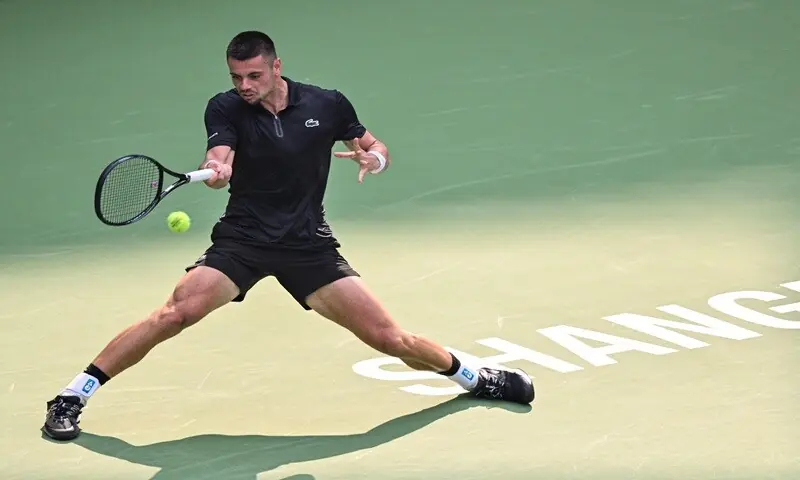 France's Arthur Gea hits a return against Ben Shelton of the US during their Shanghai Masters round-of-32 match at the Qizhong Forest Sports City Arena in Shanghai, China on October 11, 2026. —AFP France's Arthur Gea hits a return against Ben Shelton of the US during their Shanghai Masters round-of-32 match at the Qizhong Forest Sports City Arena in Shanghai, China on October 11, 2026. —AFP