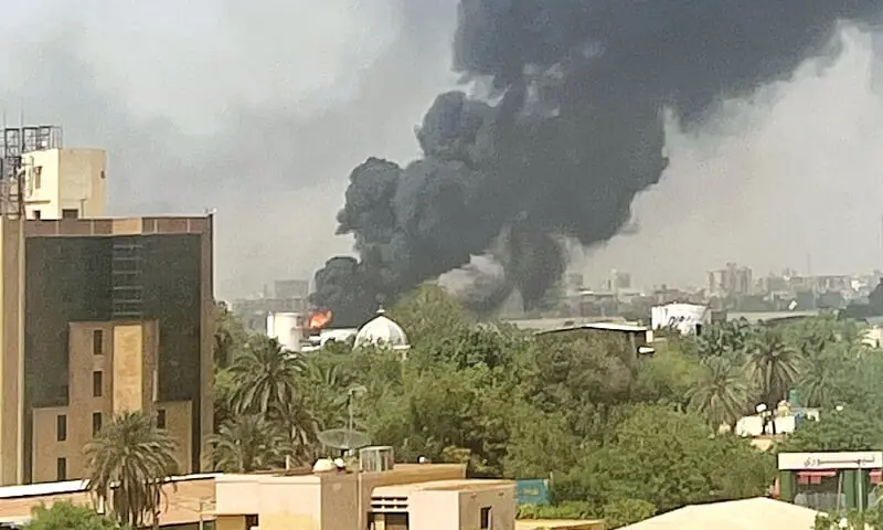 File photo shows smoke billows above residential buildings in Sudan’s capital as fighting raged in 2023. —AFP/File File photo shows smoke billows above residential buildings in Sudan’s capital as fighting raged in 2023. —AFP/File