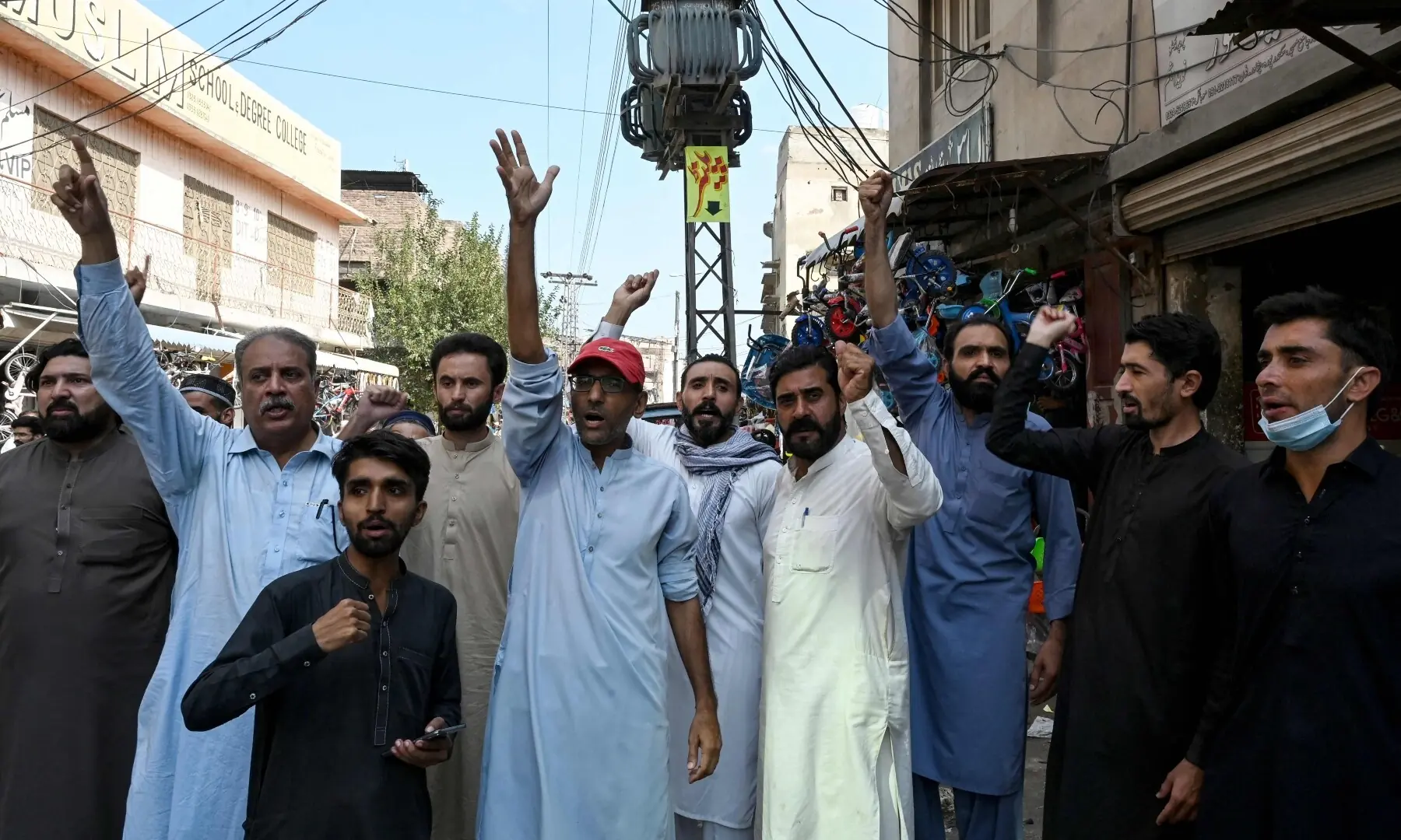 PTI supporters shout slogans during a protest, a day after the imposition of emergency and governor&rsquo;s rule  in KP on October 12, 2026. &mdash;Reuters