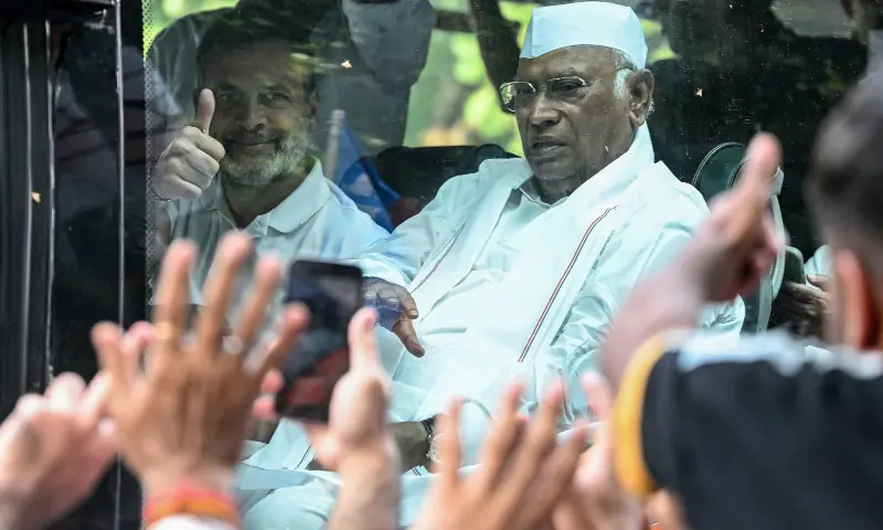 India's Congress party leader Rahul Gandhi (L), sitting inside a bus, greets his supporters during a protest march demanding the resignation of India's Chief Election Commissioner Gyanesh Kumar over alleged voter roll irregularities linked to the "special intensive revision" in New Delhi on October 12, 2026. — AFP India's Congress party leader Rahul Gandhi (L), sitting inside a bus, greets his supporters during a protest march demanding the resignation of India's Chief Election Commissioner Gyanesh Kumar over alleged voter roll irregularities linked to the "special intensive revision" in New Delhi on October 12, 2026. — AFP