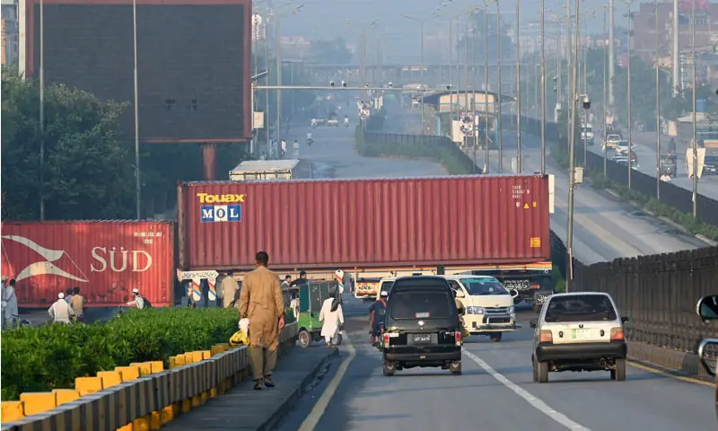CONTAINERS placed on many roads in Peshawar hinder citizens’ mobility.—Abdul Majeed Goraya CONTAINERS placed on many roads in Peshawar hinder citizens’ mobility.—Abdul Majeed Goraya