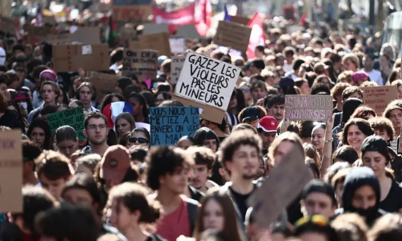 A protester holds a placard which reads as 'Park the rapists, not the minors' during a demonstration of high-school students in Marseille, southern France on October 13, 2026, as part of a nationwide high school mobilisation over learning conditions. — AFP A protester holds a placard which reads as 'Park the rapists, not the minors' during a demonstration of high-school students in Marseille, southern France on October 13, 2026, as part of a nationwide high school mobilisation over learning conditions. — AFP