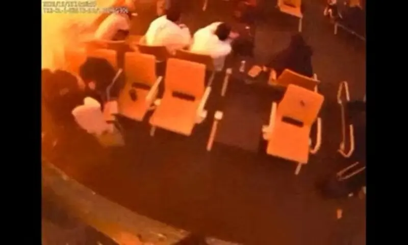 Surveillance footage shows people sitting in a waiting area reacting at the moment of an attack, in a location given as King Khalid International Airport in Riyadh, Saudi Arabia on October 10, 2026, in this frame from a handout video. — Reuters