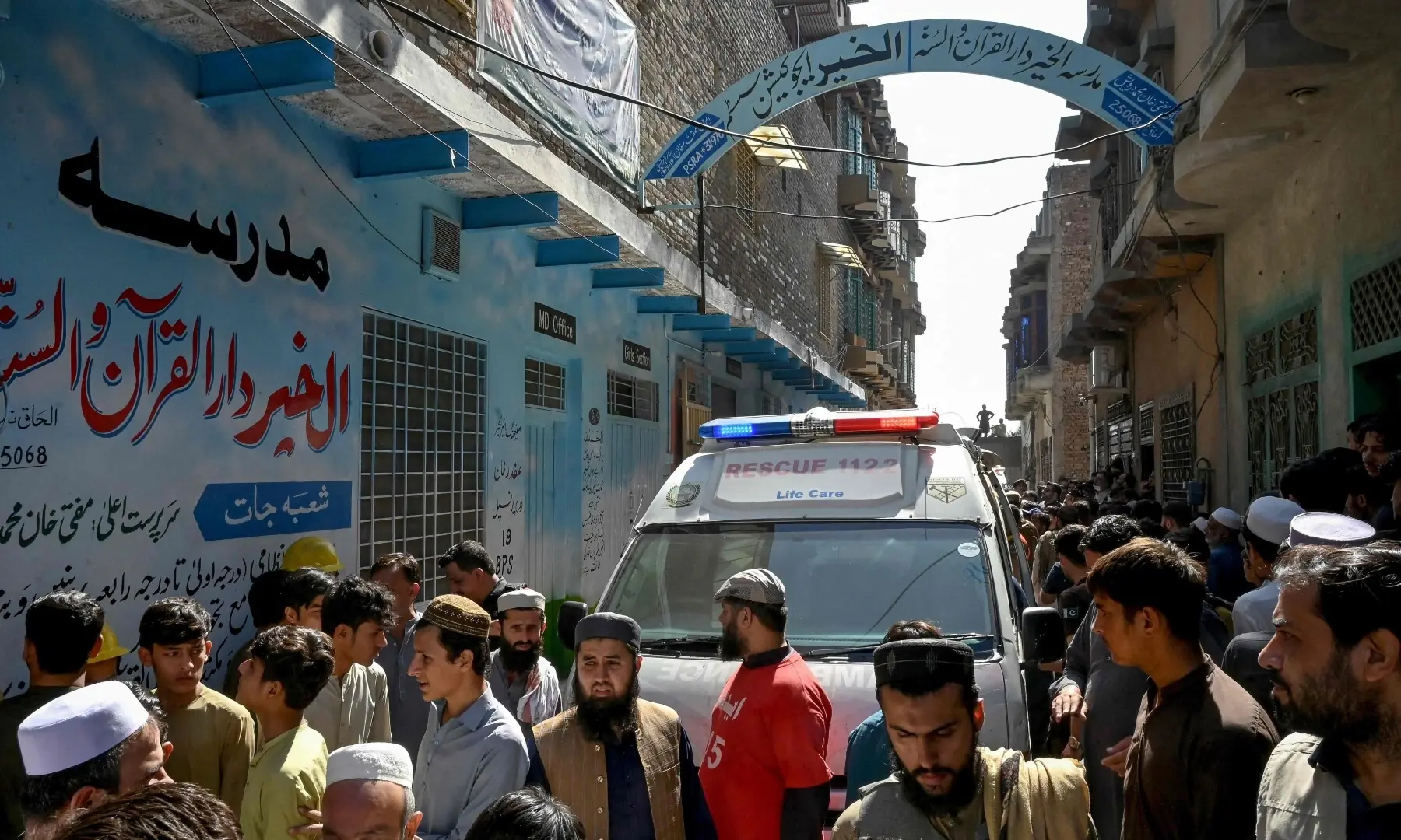 Residents gather during a search operation after a roof collapsed at a school in Peshawar on October 15, 2026. —AFP Residents gather during a search operation after a roof collapsed at a school in Peshawar on October 15, 2026. —AFP