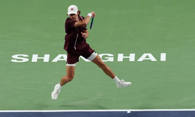 Australia’s Alex de Minaur in action during the Shanghai Masters quarter-final against Germany’s Alexander Zverev at the Qizhong Forest Sports City Arena on Thursday.—Reuters Australia’s Alex de Minaur in action during the Shanghai Masters quarter-final against Germany’s Alexander Zverev at the Qizhong Forest Sports City Arena on Thursday.—Reuters
