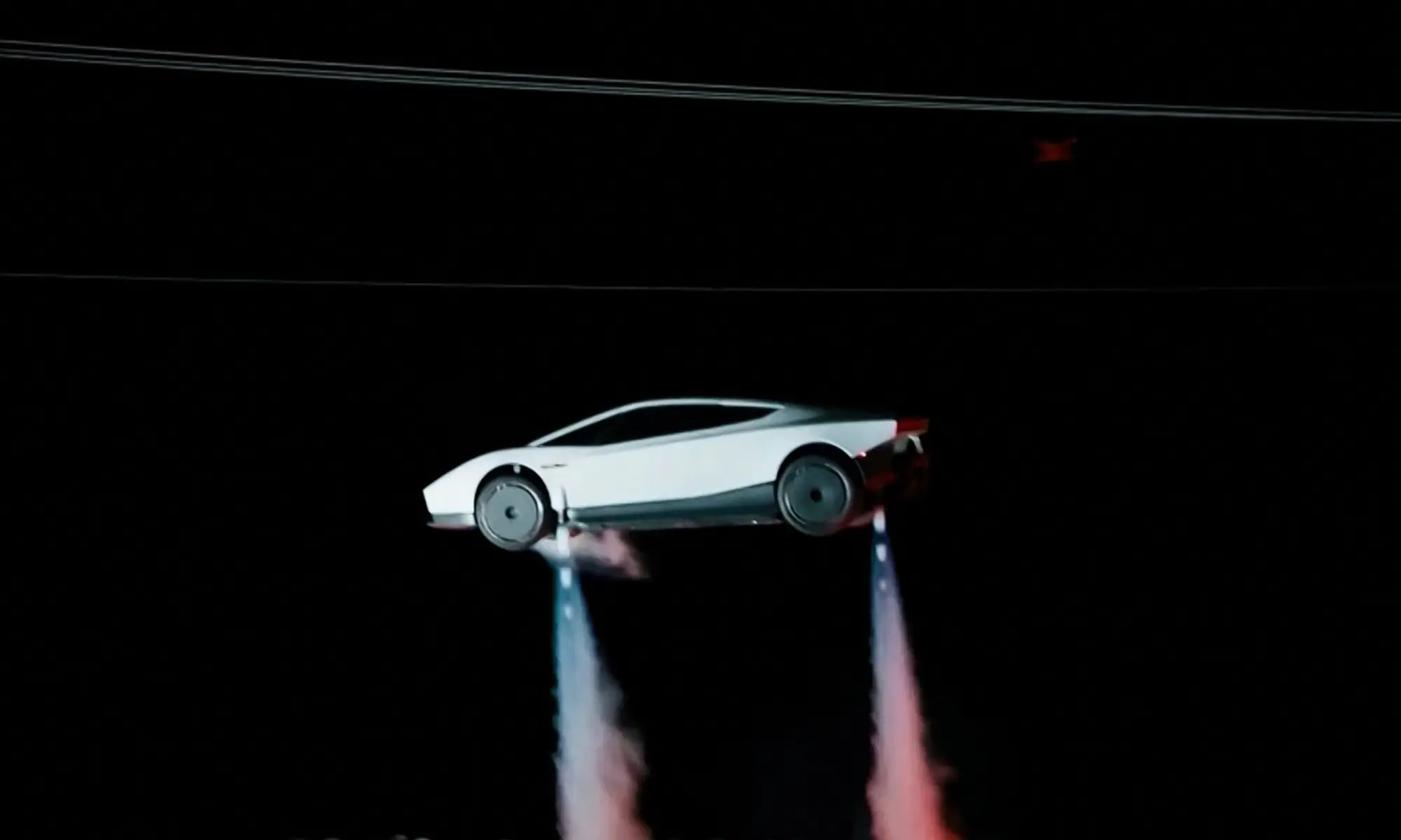 A grab taken on October 16, 2026 from a live feed released by Tesla shows the company unveiling on October 15 its next-generation Roadster electric car in McGregor, Texas, United States. &mdash; AFP